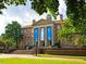 Historic campus building framed by trees with UNC banners and classic architecture at 144 Weavers Grove Dr, Chapel Hill, NC 27514