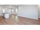 Open concept kitchen and living area with hardwood floors and island at 144 Weavers Grove Dr, Chapel Hill, NC 27514