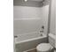 Clean bathroom showcasing a tub with shower and a standard white toilet at 145 Surles Landing Way, Benson, NC 27504