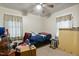Bedroom with a double bed, ceiling fan, and ample natural light at 1558 Harper St, Rocky Mount, NC 27801