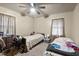Two twin beds in a well-lit bedroom with ceiling fan at 1558 Harper St, Rocky Mount, NC 27801