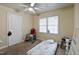 Bright bedroom with two windows and ceiling fan at 1558 Harper St, Rocky Mount, NC 27801