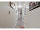 Simple hallway with carpeted floor and framed art at 1558 Harper St, Rocky Mount, NC 27801