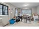 Kitchen area with a dining table and multiple appliances at 1558 Harper St, Rocky Mount, NC 27801