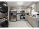 Kitchen with stainless steel appliances and light cabinets at 1558 Harper St, Rocky Mount, NC 27801