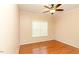 Bright bedroom with wood floors, ceiling fan, and window blinds at 1610 Rogers Pointe Ln, Creedmoor, NC 27522