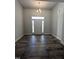 Bright entryway with hardwood floors and chandelier at 1684 Pecan Drive # 43, Nashville, NC 27856