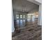 Spacious living room with hardwood floors and large windows at 1684 Pecan Drive # 43, Nashville, NC 27856