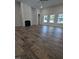 Living room with fireplace and hardwood floors at 1684 Pecan Drive # 43, Nashville, NC 27856