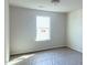 Bedroom features a window providing natural light at 204 S Beaumont Ave, Burlington, NC 27217