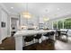 Spacious kitchen with white cabinets, marble island, and stainless steel appliances at 2105 Dunhill Dr, Raleigh, NC 27608