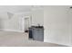 Bonus room wet bar with sink, wine cooler, and gray cabinetry at 2105 Dunhill Dr, Raleigh, NC 27608