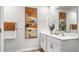 Double vanity bathroom with modern white cabinets at 233 Starlight St, Sanford, NC 27330