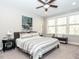 Bright bedroom featuring a king-size bed and large windows at 2508 Rambling Creek Rd, Apex, NC 27523