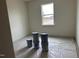 Bright bedroom featuring a window and freshly painted walls at 266 Weddington Way, Benson, NC 27504