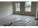 Bedroom featuring a view from two windows at 266 Weddington Way, Benson, NC 27504