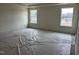 The main bedroom boasts dual windows offering ample natural light at 266 Weddington Way, Benson, NC 27504