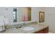 Bathroom with granite vanity and single sink at 400 W North St # 820, Raleigh, NC 27603