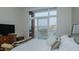Main bedroom with large windows and city views at 400 W North St # 820, Raleigh, NC 27603