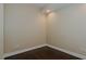 Empty bedroom with hardwood floors and neutral walls at 400 W North St # 820, Raleigh, NC 27603