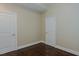 Empty bedroom with hardwood floors and neutral walls at 400 W North St # 820, Raleigh, NC 27603