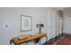 Elegant entryway with console table, hardwood floors, and neutral color palette at 400 W North St # 820, Raleigh, NC 27603
