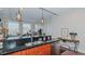Modern kitchen with stainless steel appliances and dark granite countertops at 400 W North St # 820, Raleigh, NC 27603