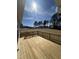 This is a wooden deck with a wooden fence overlooking the backyard at 427 Rising Star Dr, Clayton, NC 27520