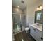 Modern bathroom featuring a glass-enclosed shower and stylish vanity at 427 Rising Star Dr, Clayton, NC 27520