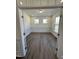 Bright office with wood-look flooring and windows that offer a scenic view at 427 Rising Star Dr, Clayton, NC 27520