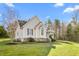 House exterior showcasing stone accents, a front porch, and a side view at 4340 Bellemont Mt Hermon Rd Rd, Burlington, NC 27215