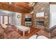 Spacious living room with stone fireplace and built-in shelving at 4340 Bellemont Mt Hermon Rd Rd, Burlington, NC 27215