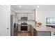 Modern kitchen featuring stainless steel appliances and granite countertops at 442 Belgian Red Way, Wake Forest, NC 27587