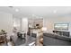 Open concept dining area with a view of the kitchen and living room at 444 Belgian Red Way, Wake Forest, NC 27587