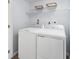 Laundry room with washer, dryer, and shelving at 4505 Black Drum Dr, Raleigh, NC 27616