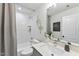 Clean bathroom with a shower/tub combo and modern vanity at 4821 Gossamer Ln # 106, Raleigh, NC 27616