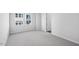 Light filled bedroom with plush carpeting, a window overlooking the neighborhood, and closet access at 602 Hillfarm Dr, Wake Forest, NC 27587