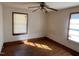 Bedroom with hardwood floors and ceiling fan at 605 E Montgomery St, Henderson, NC 27536