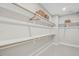 Spacious walk-in closet with ample shelving and hanging space at 606 Hyperion Aly, Wake Forest, NC 27587