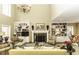 Two-story living room with a fireplace and built-ins at 6146 Saddlehorn Dr, Rocky Mount, NC 27803