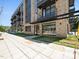 Modern brick building with commercial space and residential units at 615 W Peace St # 304, Raleigh, NC 27605