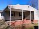 Another side view of the house with carport at 618 N Third St, Mebane, NC 27302