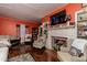 Spacious living room with hardwood floors, fireplace and built-in shelving at 6238 Old 421 Rd, Liberty, NC 27298