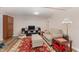 Finished basement with living area and neutral decor at 6301 King Lawrence Rd, Raleigh, NC 27607