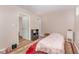 Small bedroom with pink bedding and red carpet at 6301 King Lawrence Rd, Raleigh, NC 27607