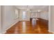 Dining room with hardwood floors and access to patio at 6301 King Lawrence Rd, Raleigh, NC 27607