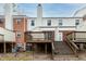 Brick townhouse with deck and stairs at 6409 New Market Way, Raleigh, NC 27615