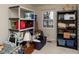 Bedroom with shelving units and window at 6409 New Market Way, Raleigh, NC 27615