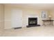 Living room with fireplace and neutral decor at 6409 New Market Way, Raleigh, NC 27615