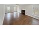 Living room with hardwood floors and fireplace at 709 Pineburr Pl, Durham, NC 27703